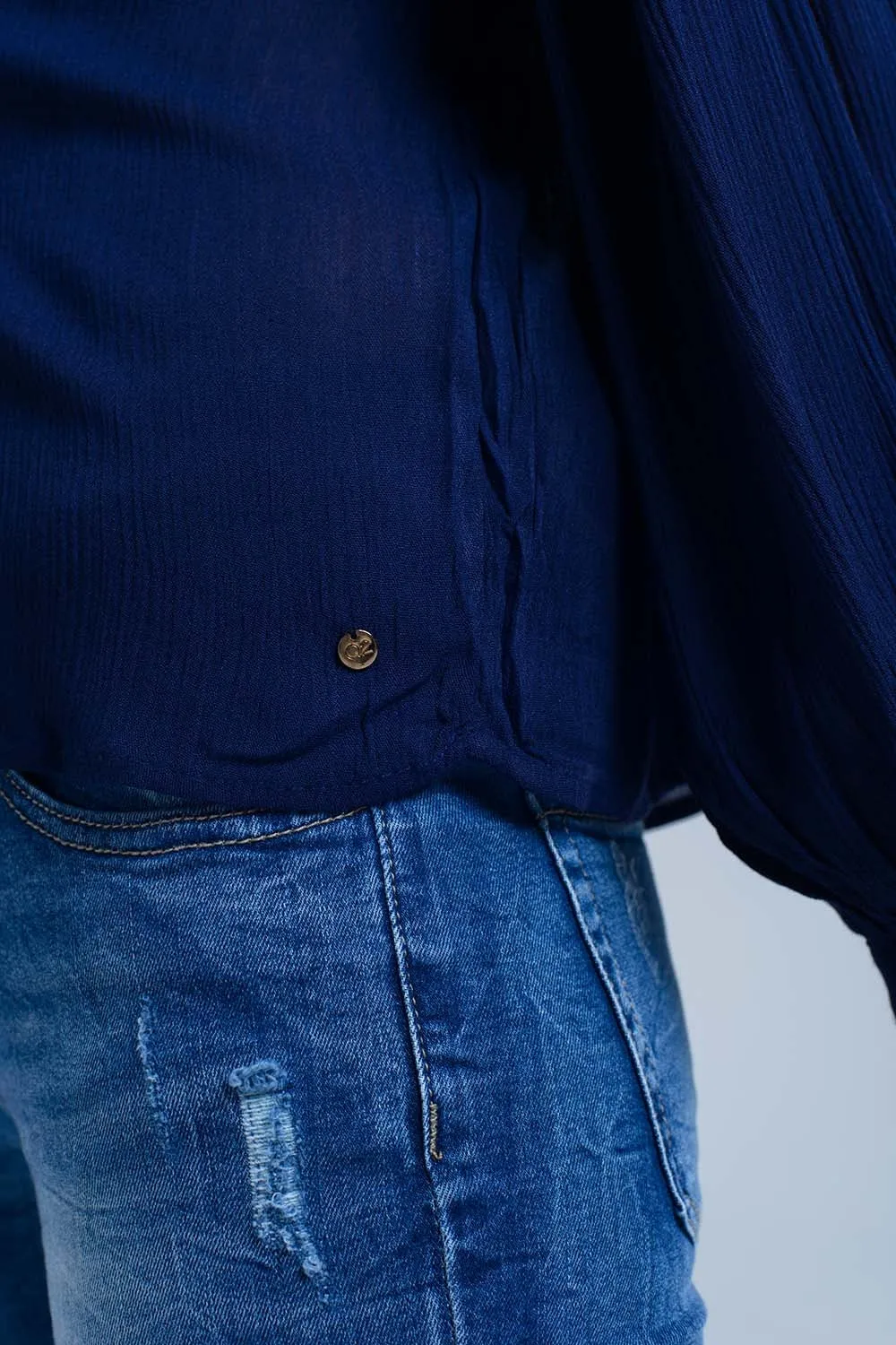 Embroidered navy blouse